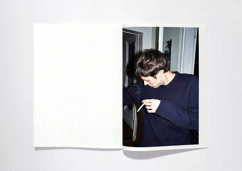 Cristaseya, Homme Catalogue, double spread with a model smoking, photo by Andrea Spotorno.